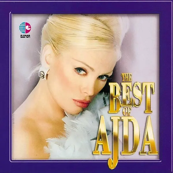 The Best of Ajda derleme albümünün kapağı; mor zemin önünde beyaz kürk içinde sarışın Ajda Pekkan ve altın harflerle albüm adı