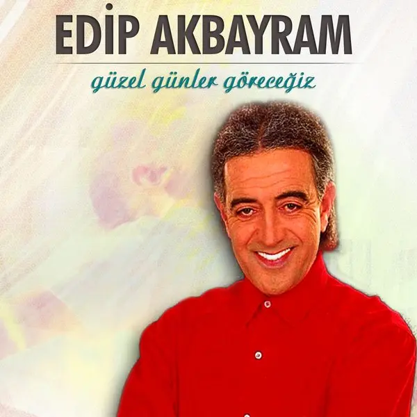 Edip Akbayram’ın Güzel Günler Göreceğiz albüm kapağı; kırmızı kazaklı, gülümseyen Edip Akbayram