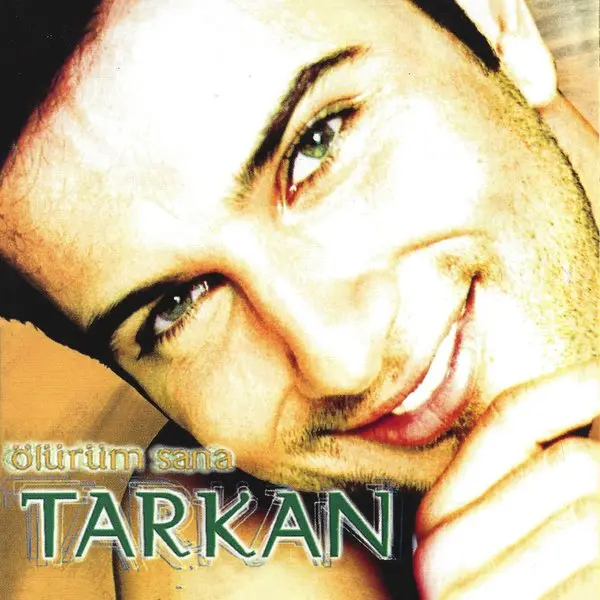 Tarkan’ın Ölürüm Sana albüm kapağı; elini yanağına dayamış, gülümseyen Tarkan’ın yakın çekim portresi ve altta Tarkan yazısı
