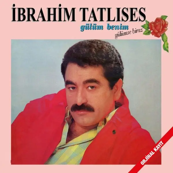 İbrahim Tatlıses’in Gülüm Benim / Gülümse Biraz albüm kapağı; pembe zemin önünde kırmızı ceketli İbrahim Tatlıses’in portresi, sağ üstte kırmızı bir gül ve İbrahim Tatlıses yazısı