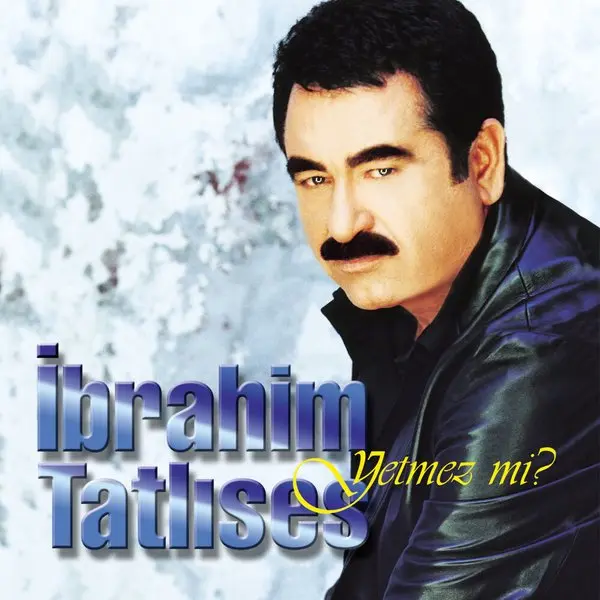 İbrahim Tatlıses’in Yetmez mi? albüm kapağı; buz mavisi zemin önünde siyah deri ceketli İbrahim Tatlıses’in portresi ve altta mavi harflerle İbrahim Tatlıses yazısı