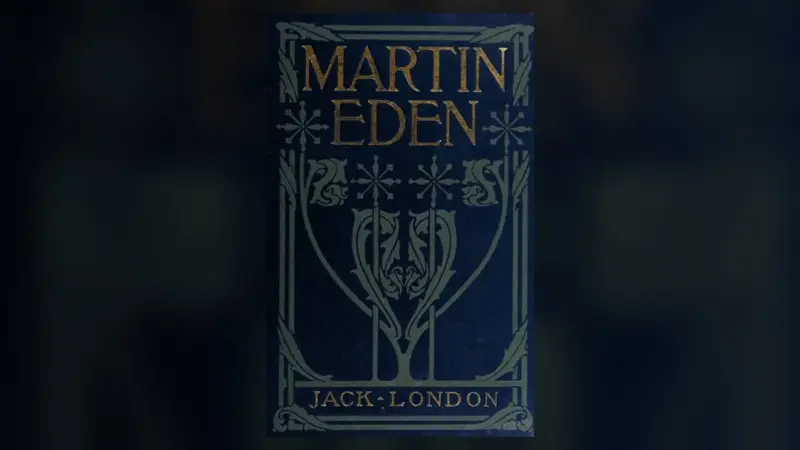 Jack London’ın Martin Eden romanının 1909 Macmillan ilk baskısının lacivert kapağı: altın harflerle MARTIN EDEN başlığı ve altta JACK LONDON yazısı, yeşil bitkisel süslemeler