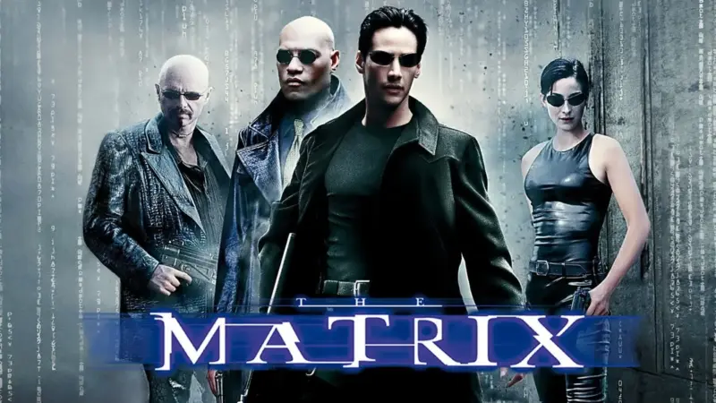 Matrix filminin tanıtım görseli: yeşil kod yağmuru akan gri duvarın önünde siyah deri kıyafetli ve güneş gözlüklü Cypher, Morpheus, Neo ve Trinity; altta mavi harflerle MATRIX yazısı