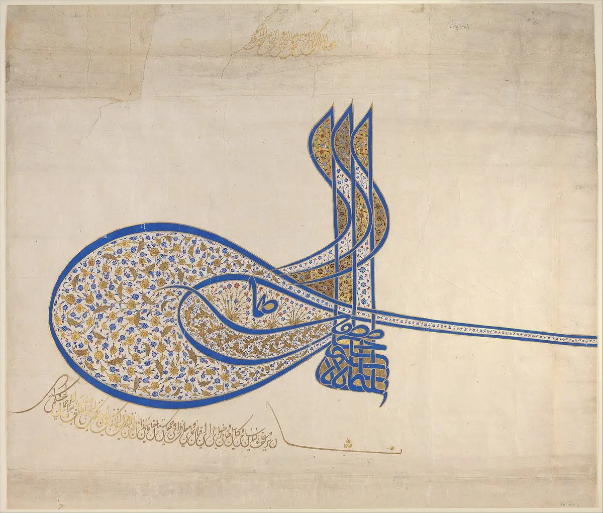 Kanuni Sultan Süleyman’ın lacivert ve altın renkli, çiçek desenleriyle bezeli büyük tuğrası