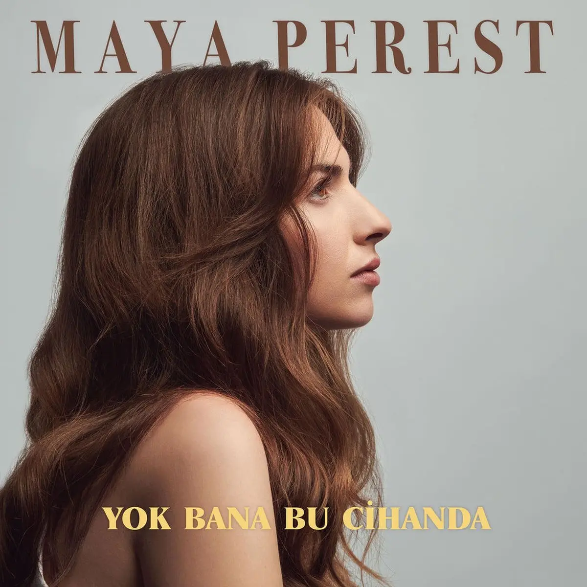 Maya Perest’in Yok Bana Bu Cihanda single kapağı; açık zemin önünde uzun kahverengi saçlarıyla yana bakan Maya Perest ve üstte sanatçının adı