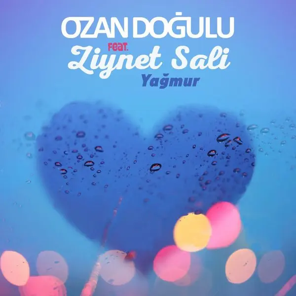 Ozan Doğulu ve Ziynet Sali’nin Yağmur tekli kapağı; mavi tonlarda cam üzerinde kalp biçiminde yağmur damlaları